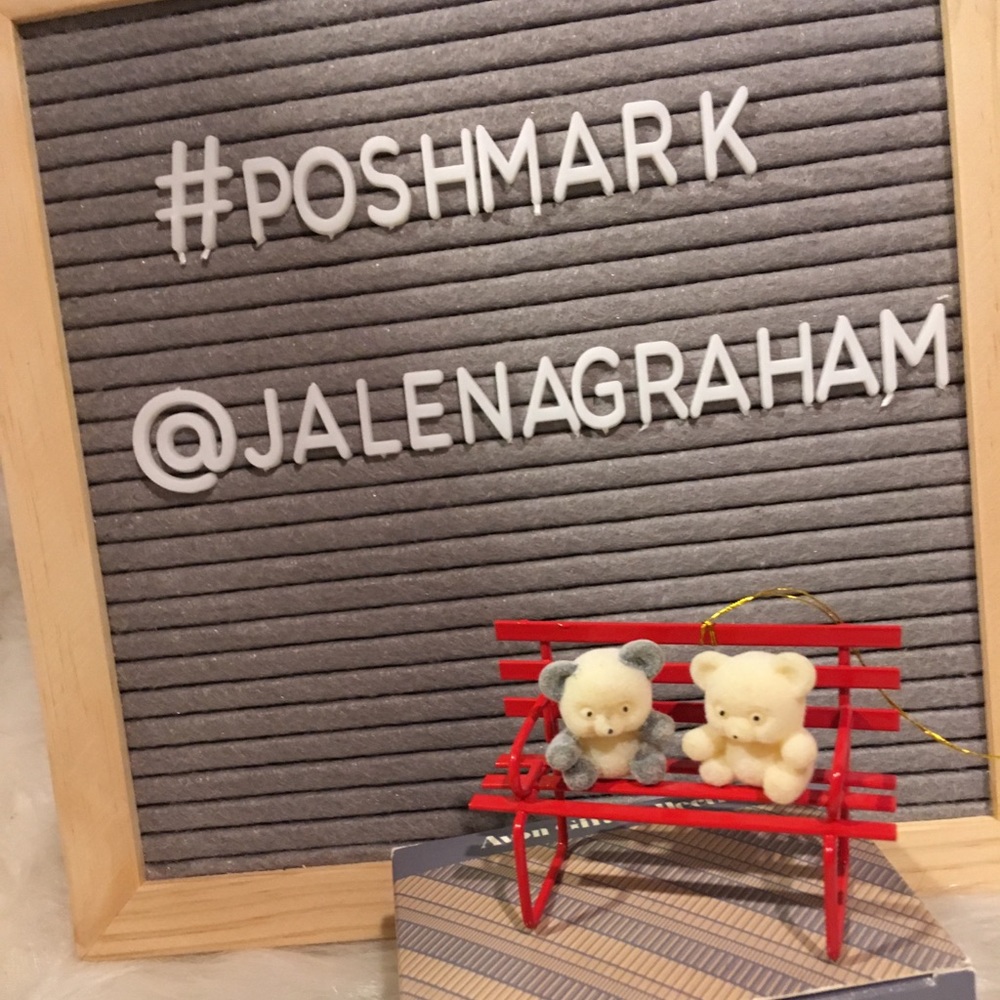 Avon teddy bear collection ornament on bench